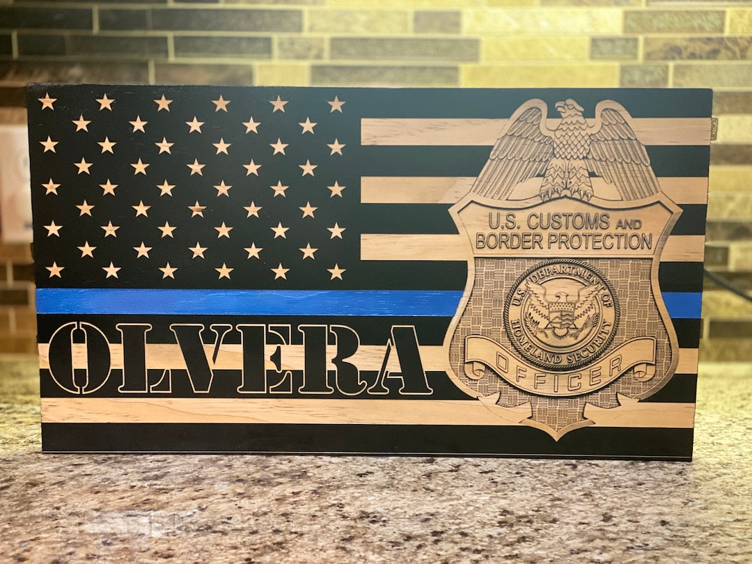 Custom engraved CBP wood flag with blue line and officer name